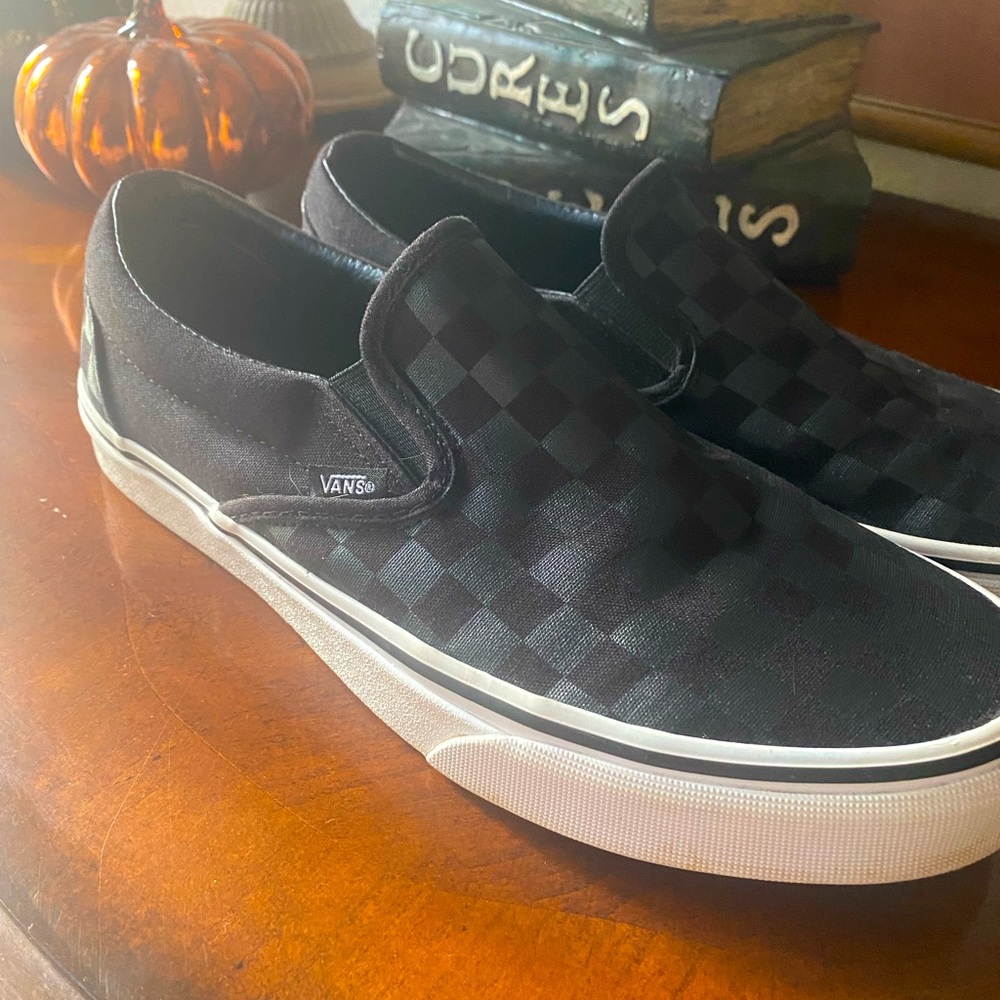 Vans classic black/black checkerboard.
